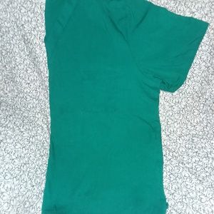 Single pocket scrub top